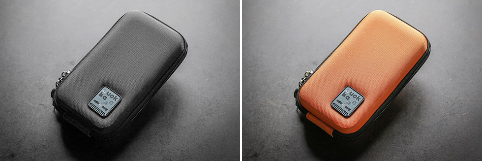 La pochette pour téléphone portable Quokka existe en noir et en orange